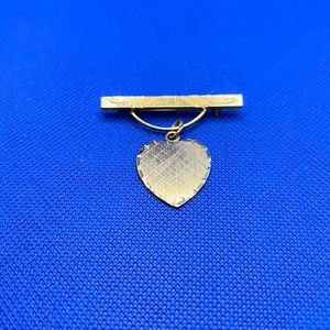 Vintage bar brooch with dangling heart, etched Used in good condition